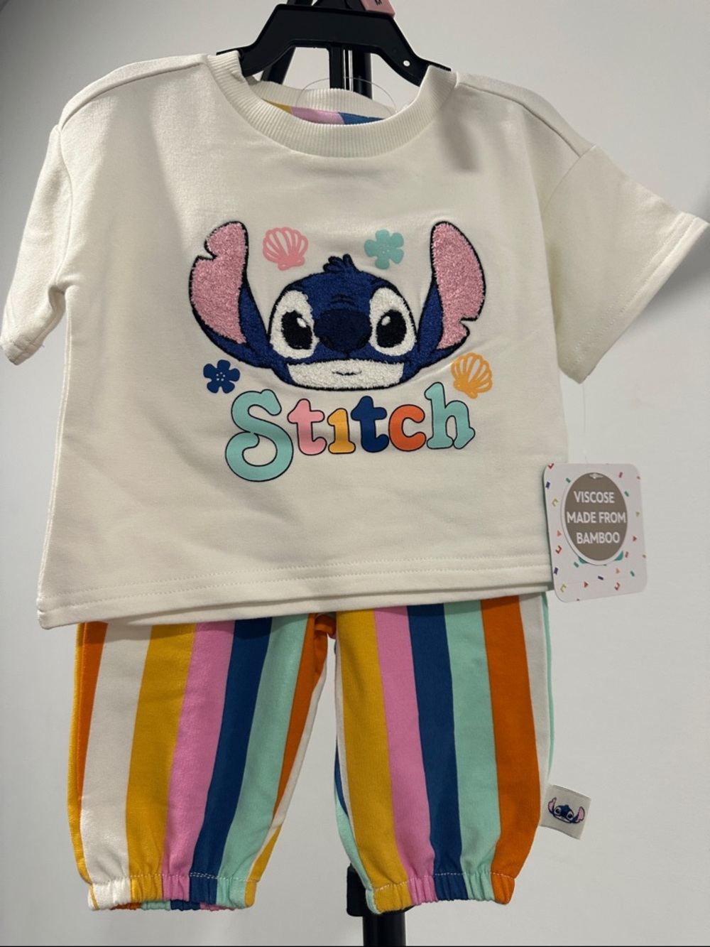 Disney Stitch Short Sleeve Top with Multi-Color Striped Pants